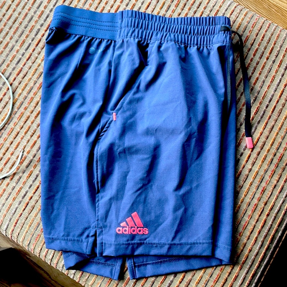 New with tags-athletic shorts with pockets.